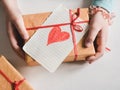 Little daughter holding a gift