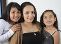 This little daugthers give a kiss to her mother Royalty Free Stock Photo