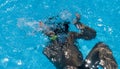 Little diver in the pool under water Royalty Free Stock Photo