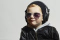 Little DJ. funny boy in sunglasses and headphones Royalty Free Stock Photo