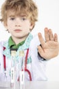 Little doctor shows stop sign with his hand Royalty Free Stock Photo