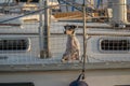 Little dog on a sailing boat Cute dog on luxury yacht deck Royalty Free Stock Photo