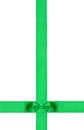 Little double green bow on two crossing ribbons Royalty Free Stock Photo