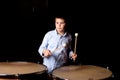 Little drummer with drumsticks