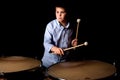 Little drummer with drumsticks