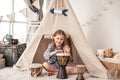 Little drummer girl playing on djembe Royalty Free Stock Photo
