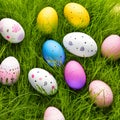 Little Easter bunny and Easter eggs on green grass Royalty Free Stock Photo