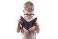 Little educated boy reading book Royalty Free Stock Photo