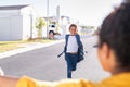 Little elementaty student girl running to mother after school Royalty Free Stock Photo