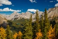 Little emerald lake hidden in the middle of bushes from Pocaterra ridge in Kananaskis country, Canada Royalty Free Stock Photo