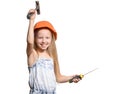 Little Engineer, Little girl wearing the construction helmet, with a hammer and a saw in his hand,isolated over white background Royalty Free Stock Photo