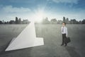 Little entrepreneur with paper airplane Royalty Free Stock Photo