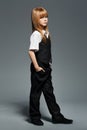 Little fashionable girl in black costume Royalty Free Stock Photo