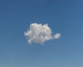 Little fat cloud in clean blue sky, panorama format Royalty Free Stock Photo
