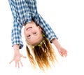 Little fgirl hanging upside down Royalty Free Stock Photo