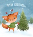 Little fox decorates a Christmas tree Royalty Free Stock Photo