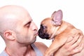 Little french bulldog puppy with a guy