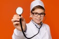 Little friendly doctor ready to examine you Royalty Free Stock Photo