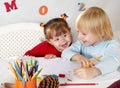 Little friends at a drawing lesson Royalty Free Stock Photo