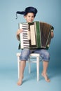 Little funny accordion player Royalty Free Stock Photo