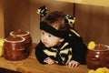 Little funny baby with bee costume Royalty Free Stock Photo