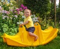 Little funny baby on his favorite swing