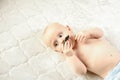 Little funny boy with childish nipple in the form of a mustache. funny baby emotions. Baby Care Hygiene. space for text