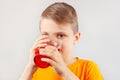 Little funny boy drinking fresh red lemonade Royalty Free Stock Photo