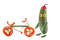 Little funny cucumber standing with bicycle. The picture is made Royalty Free Stock Photo