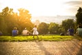 Little funny girl playing on green grass, Prague, august 2015