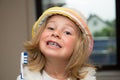 Little funny girl with retainer and toothbrush Royalty Free Stock Photo