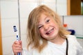 Little funny girl with retainer and toothbrush Royalty Free Stock Photo