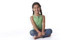 Little funny girl sitting on the floor Royalty Free Stock Photo