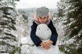 Little  funny girl and snowman in the snowly park Royalty Free Stock Photo