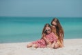 Little happy funny girls have a lot of fun at tropical beach playing together Royalty Free Stock Photo