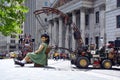 The little giant girl sleeping in Place d`arme