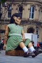 The little giant girl sleeping in Place d`arme