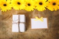 Little gift box with with yellow flowers