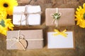 Little gift boxes with with yellow flowers