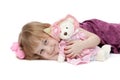 A little girl 4 years old with a plush toy bear Royalty Free Stock Photo