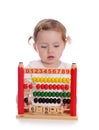 Little girl with abacus Royalty Free Stock Photo