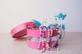 Little girl accessories lifestyle set in a pink box. Royalty Free Stock Photo