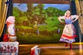 A little girl and an adult woman in Russian national dress rehearsing on stage. Mother and daughter sing and dance together Royalty Free Stock Photo