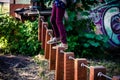 Little girl in Aerial Activity park balancing on tightrope Royalty Free Stock Photo