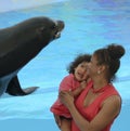 A Little Girl Afraid of a Friendly Sea Lion at Delphinario, Sonora, Mexico
