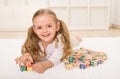 Little girl with alphabet wooden blocks playing Royalty Free Stock Photo