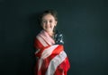 Little girl with the American flag Royalty Free Stock Photo