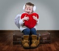 Little girl with angels wings and heart Royalty Free Stock Photo