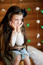 Little girl in anticipation of Christmas night Royalty Free Stock Photo