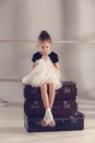 The little girl as balerina dancer sitting at studio Royalty Free Stock Photo